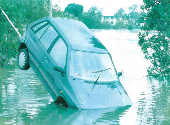 Townsville flood 1998 - Car swept away by floodwaters. (Photo - Queensland Newspapers)